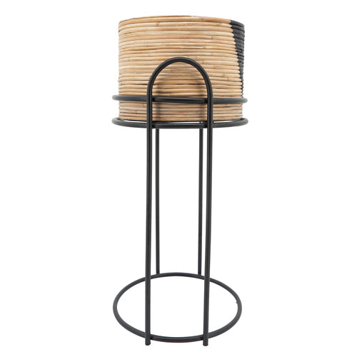 Wicker planter in stand